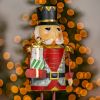 "Nikolai" the Metal Nutcracker Holding Gifts