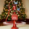 Old Style Iron Water Pump with "Merry Christmas" Sign and Birds