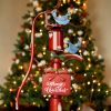 Old Style Iron Water Pump with "Merry Christmas" Sign and Birds