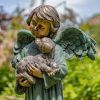 "Kaileigh" the Magnesium Angel Statue Holding Dog